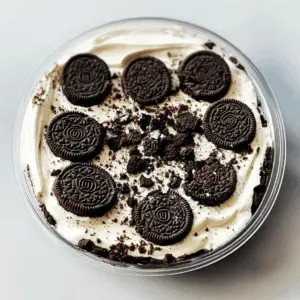 This Heavenly Oreo Dessert is a chocolate lover's dream! With layers of creamy goodness and crunchy Oreo pieces, it's perfect for any occasion. Easy to make and always a hit at parties or family gatherings. Save this indulgent recipe for your next sweet craving or special celebration!